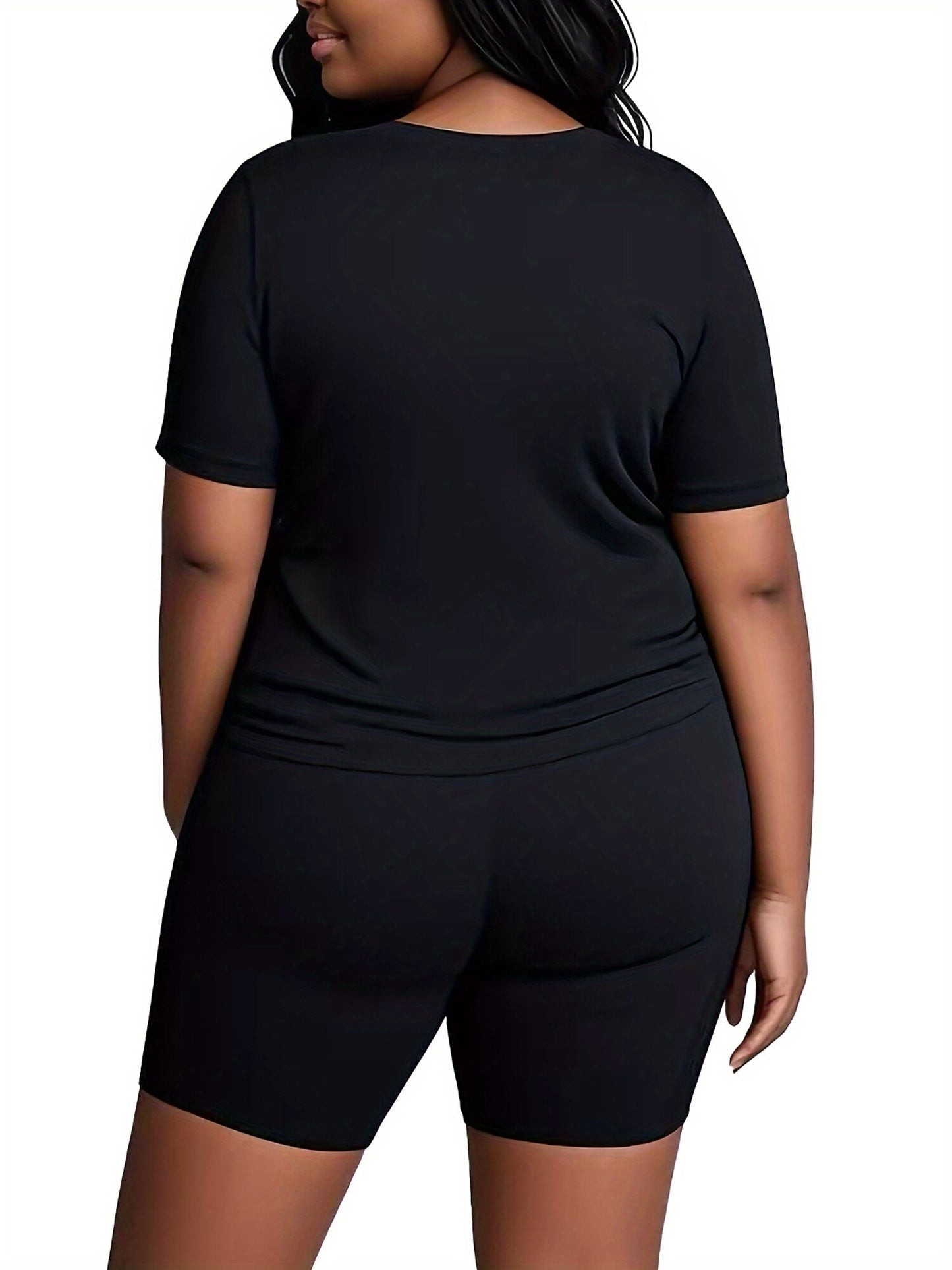 A Two-Piece Outfit Featuring a Printed Short-Sleeve T-Shirt with Dropped Shoulders And Cropped Leggings, Designed for Plus-Size Women, Licensed with Mickey And Minnie.