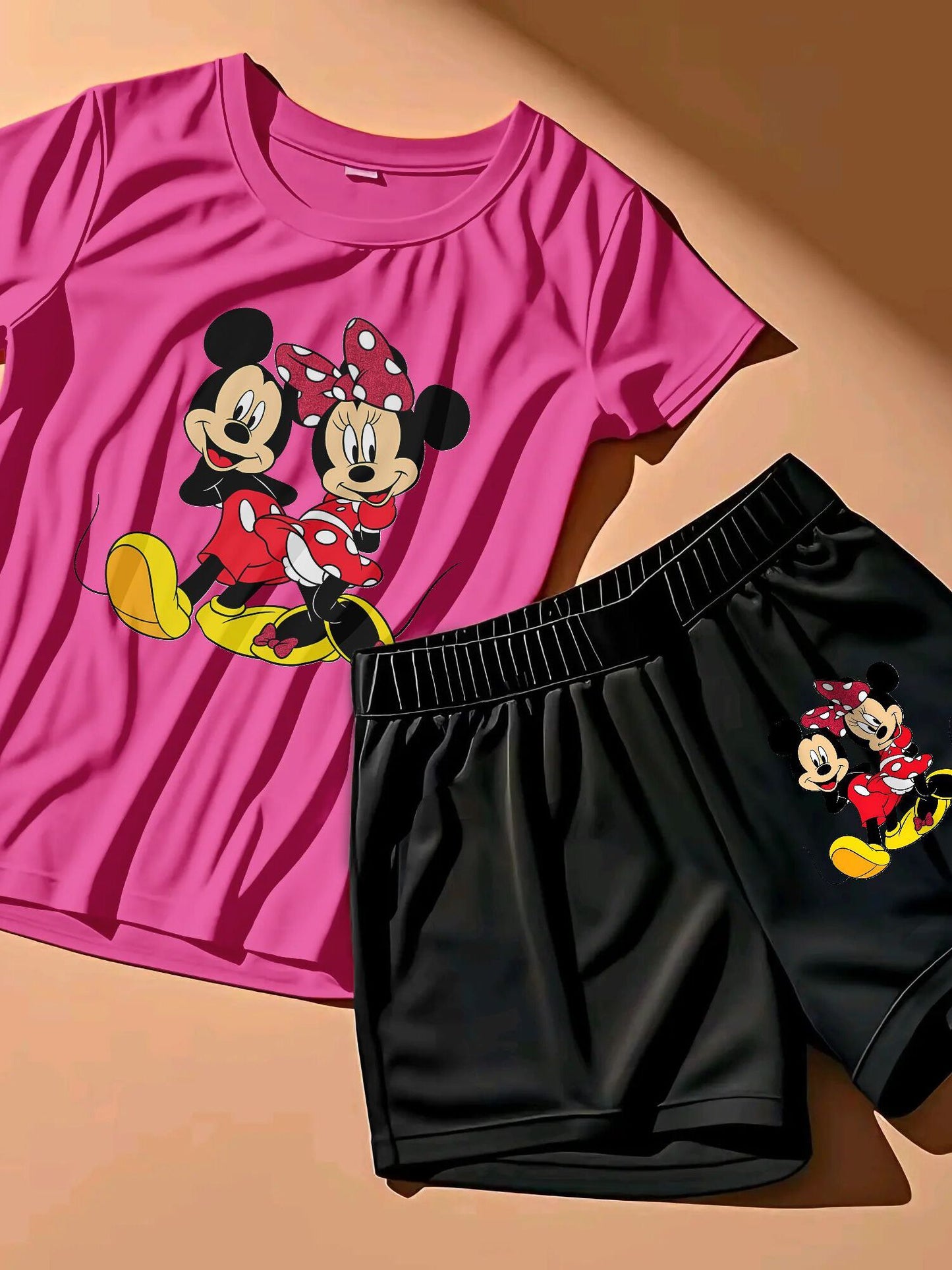 A Two-Piece Outfit Featuring a Printed Short-Sleeve T-Shirt with Dropped Shoulders And Cropped Leggings, Designed for Plus-Size Women, Licensed with Mickey And Minnie.