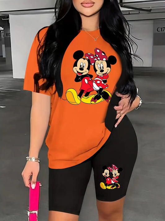 A Two-Piece Outfit Featuring a Printed Short-Sleeve T-Shirt with Dropped Shoulders And Cropped Leggings, Designed for Plus-Size Women, Licensed with Mickey And Minnie.